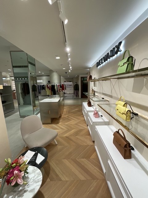 Delvaux — Harrods — Client lounge seating on herringbone parquet flooring